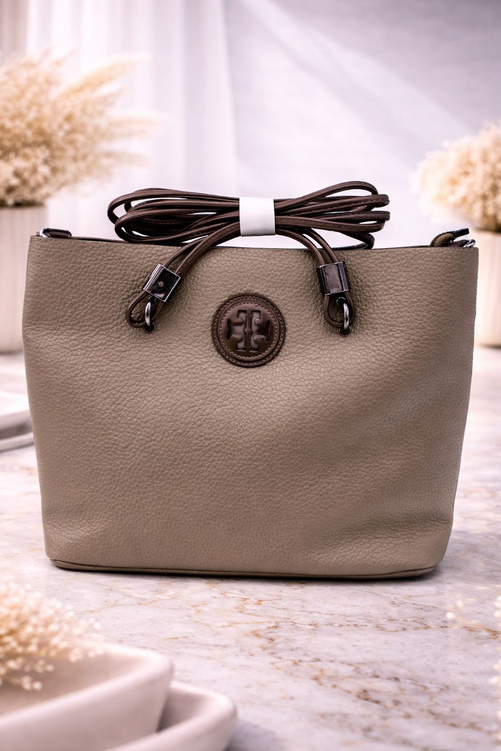 Imported pio leather handbag